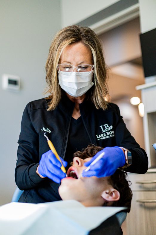 Patient undergoing dental cleaning