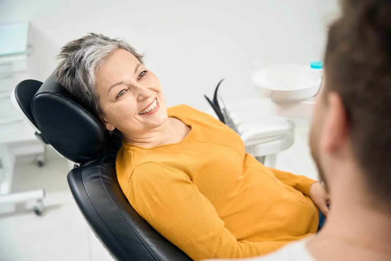 happy patient smiling with dentures